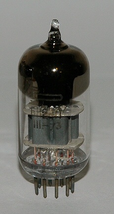 A vacuum tube — a glass bottle with wires inside, like an old light bulb